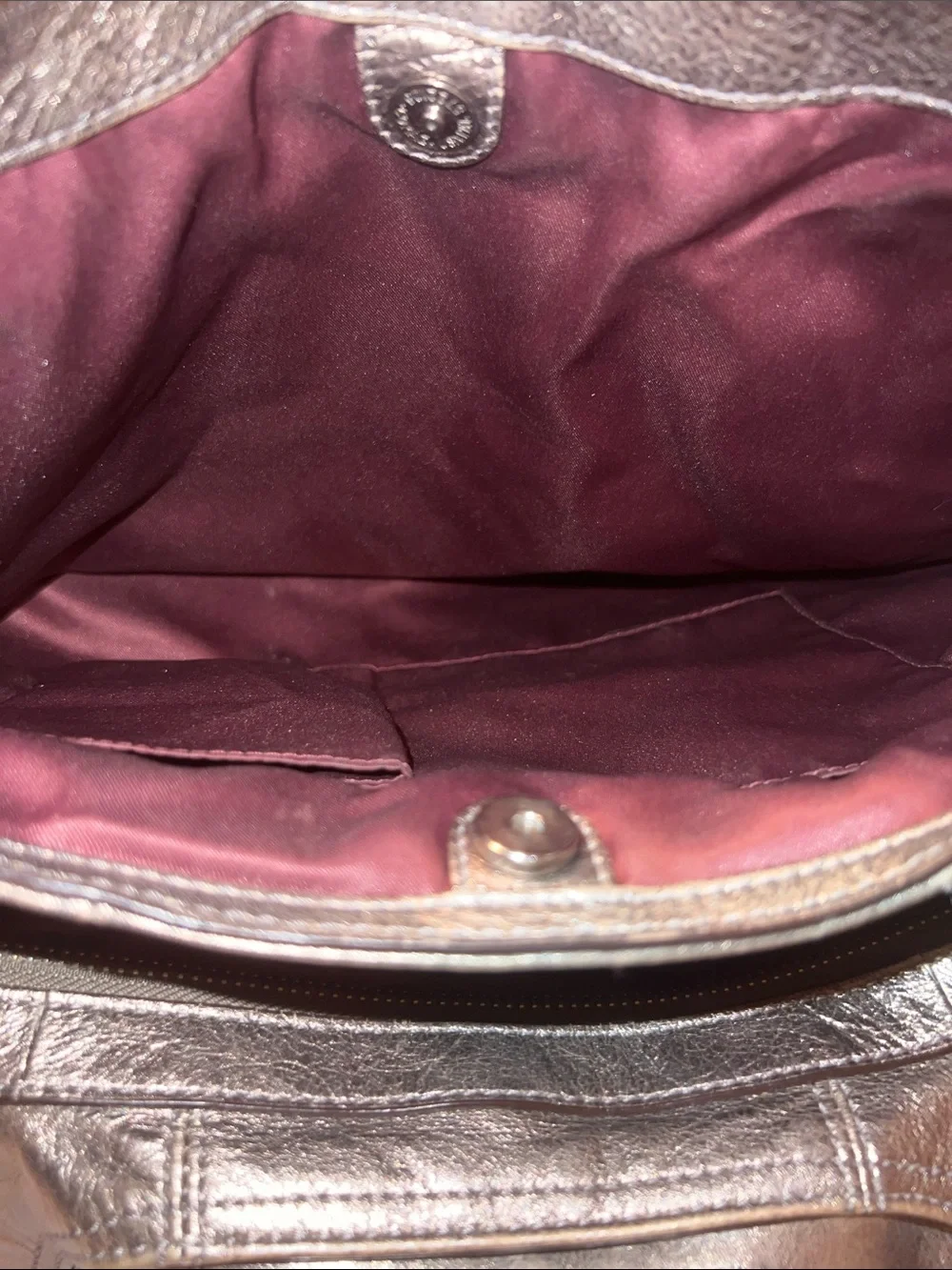 Coach Madison Maggie hobo shoulder bag featuring a metallic gunmetal leather